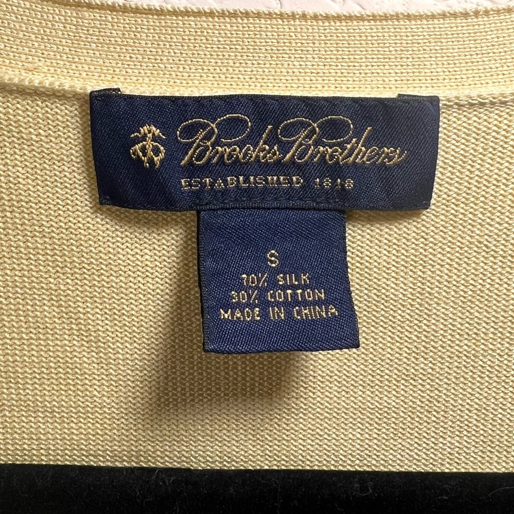 Silk Brooks Brothers buttoned up cardigan, yellow has a small stain on the front